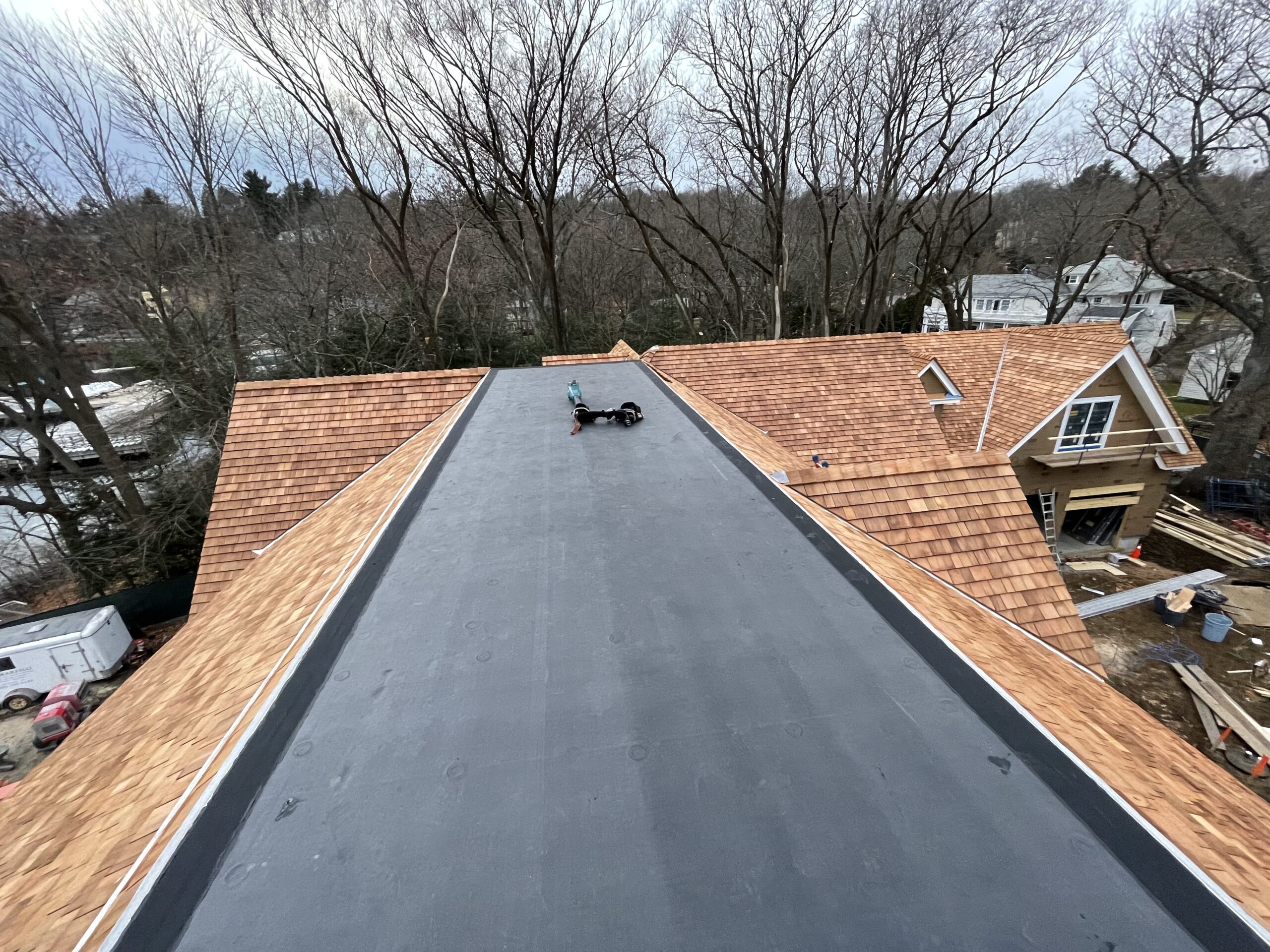 EPDM and TPO membrane comparison for commercial flat roofing Cape Cod