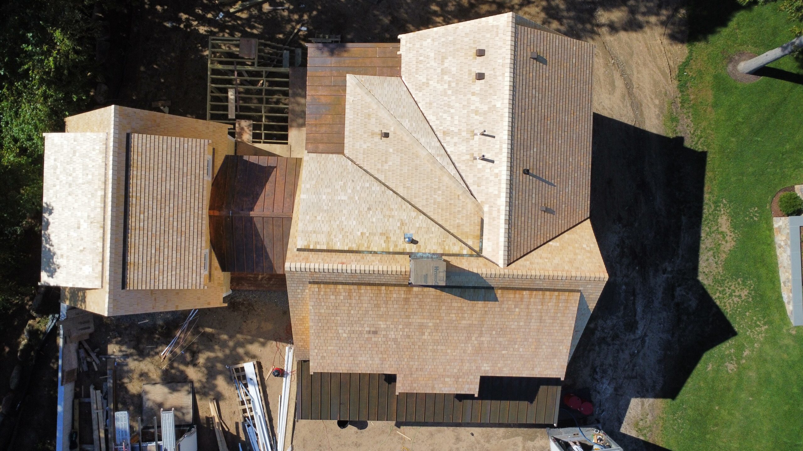 Professional cedar shingle installation on Cape Cod residential home