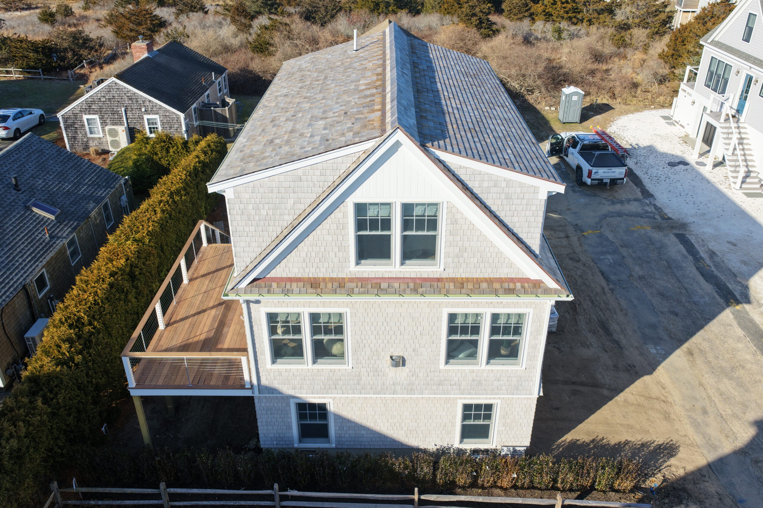 Red cedar roof with woven ridge caps detail