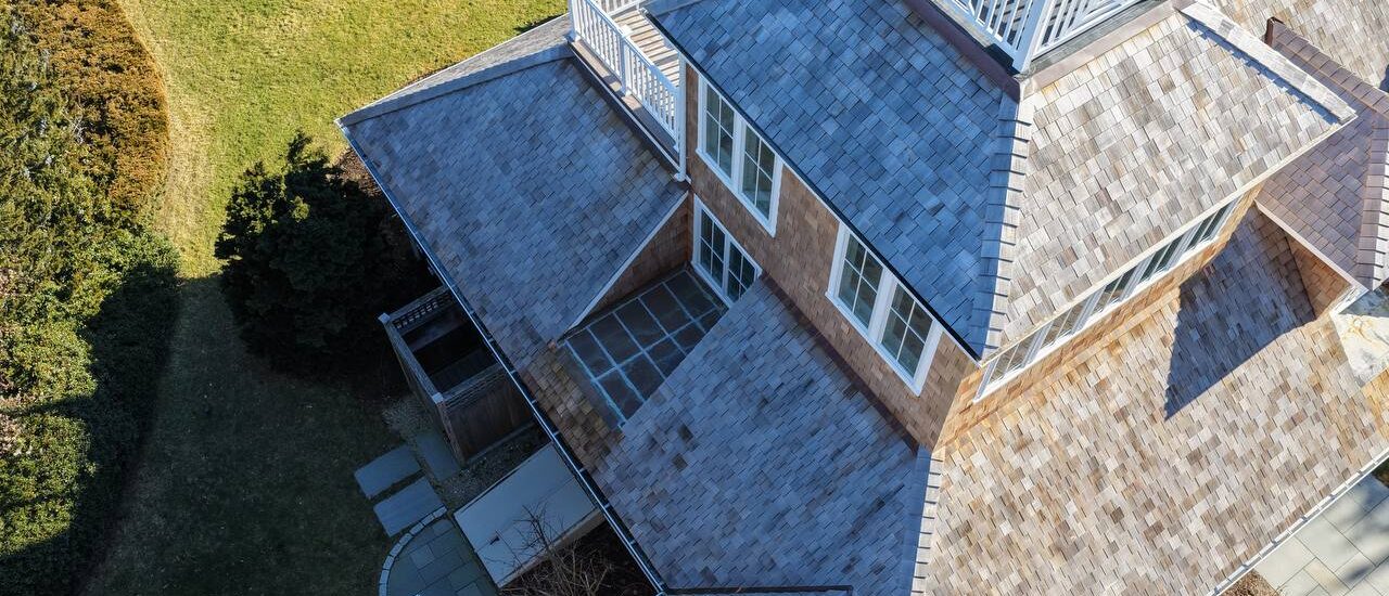 home_exterior_restoration_cedar_and_asphalt