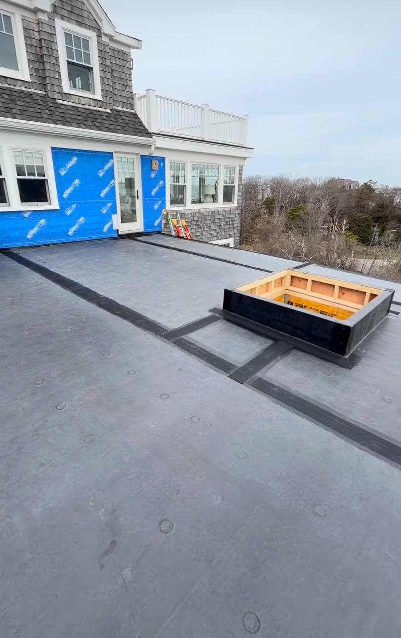 Flat roof repair project on Cape Cod - EPDM membrane installation