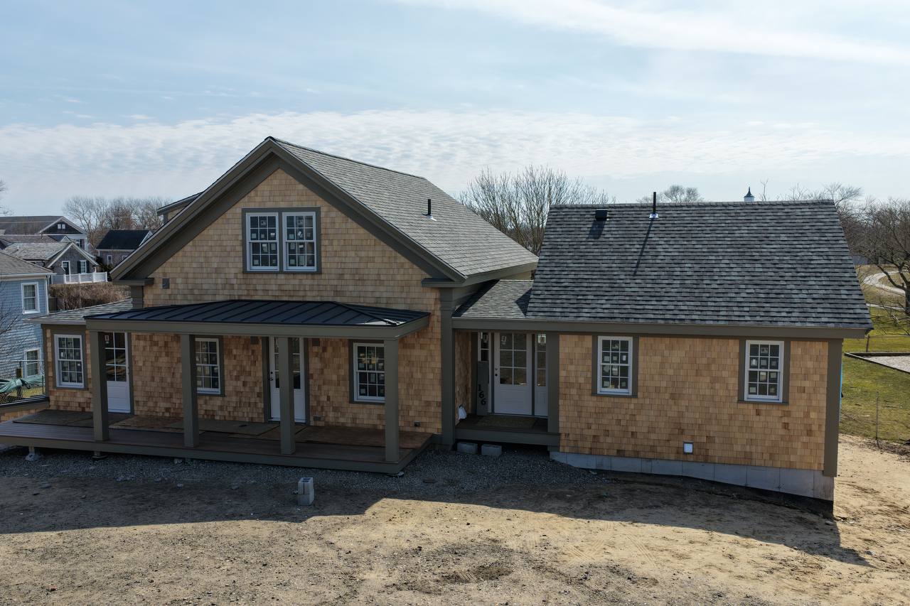 Natural white cedar sidewall installation in Chatham
