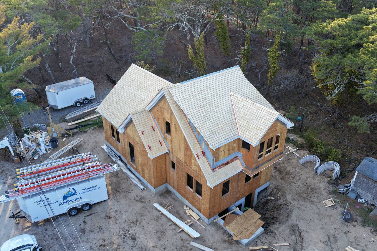 Yellow cedar roof with weaved caps - view 2