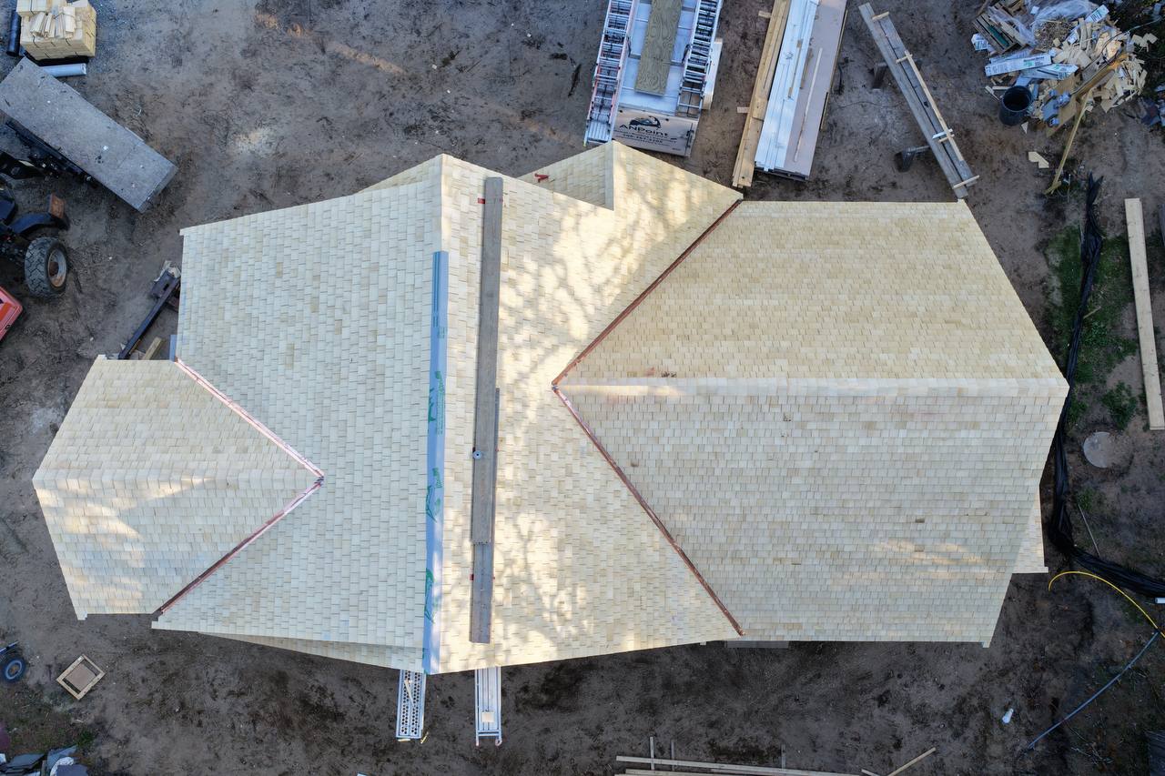 Yellow cedar roof installation progress