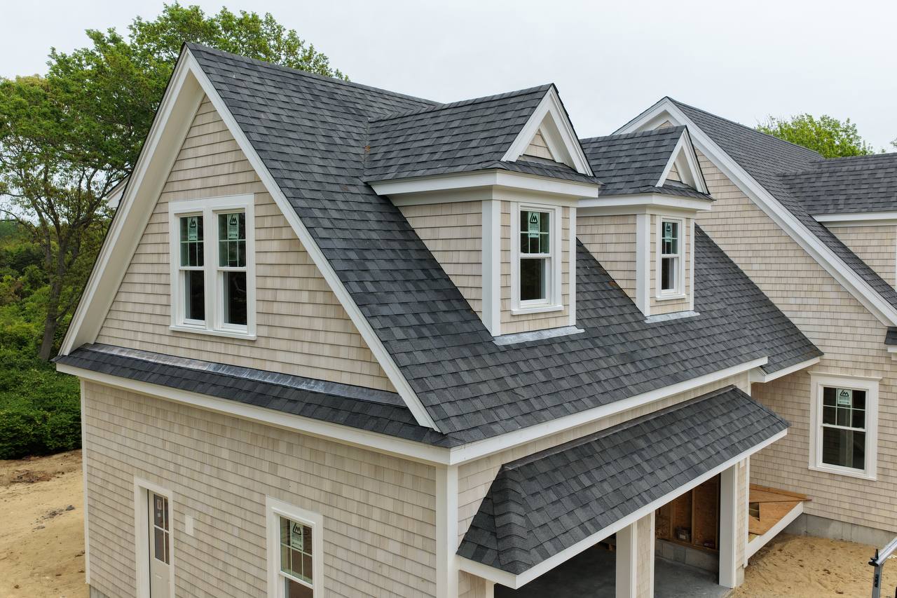 Complete exterior renovation Dennis MA asphalt roof siding