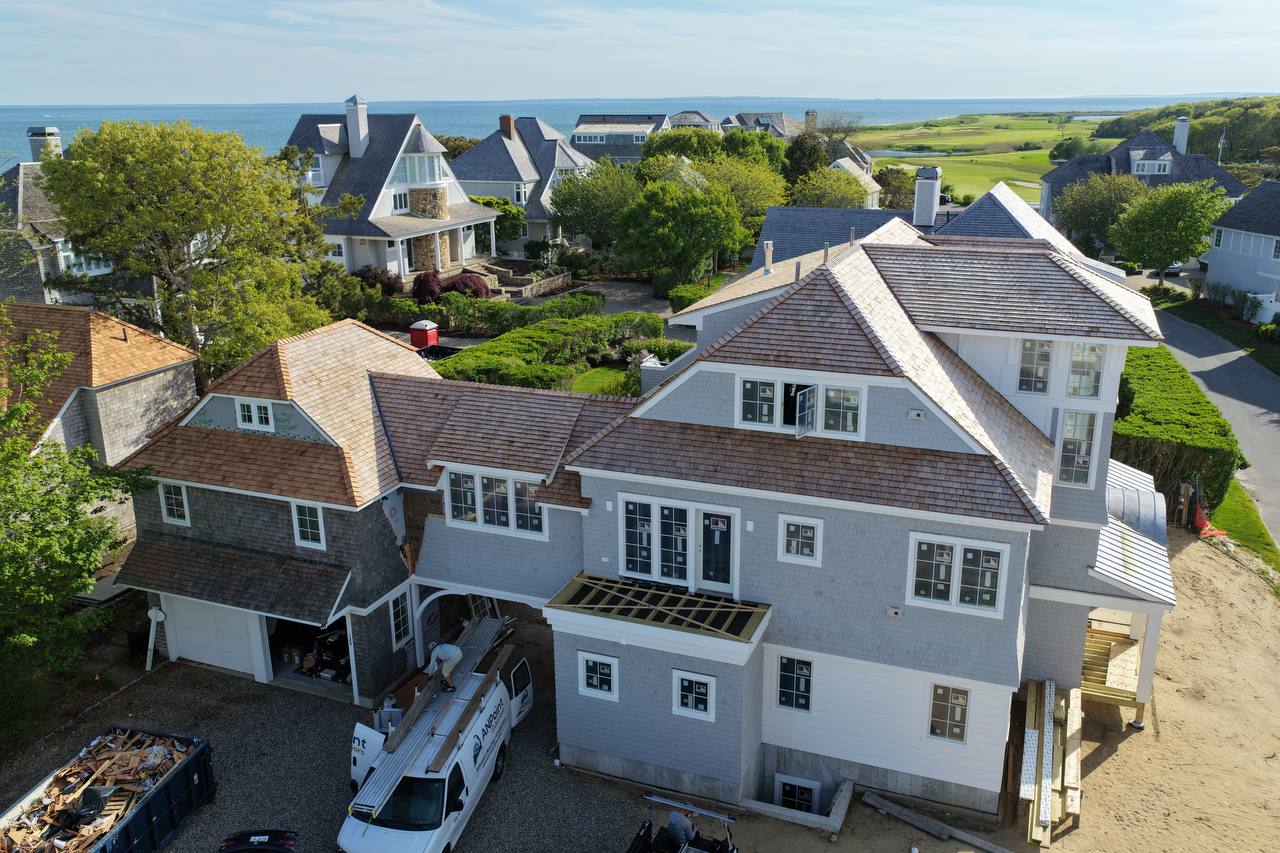 Completed red cedar roof in Mashpee with woven caps