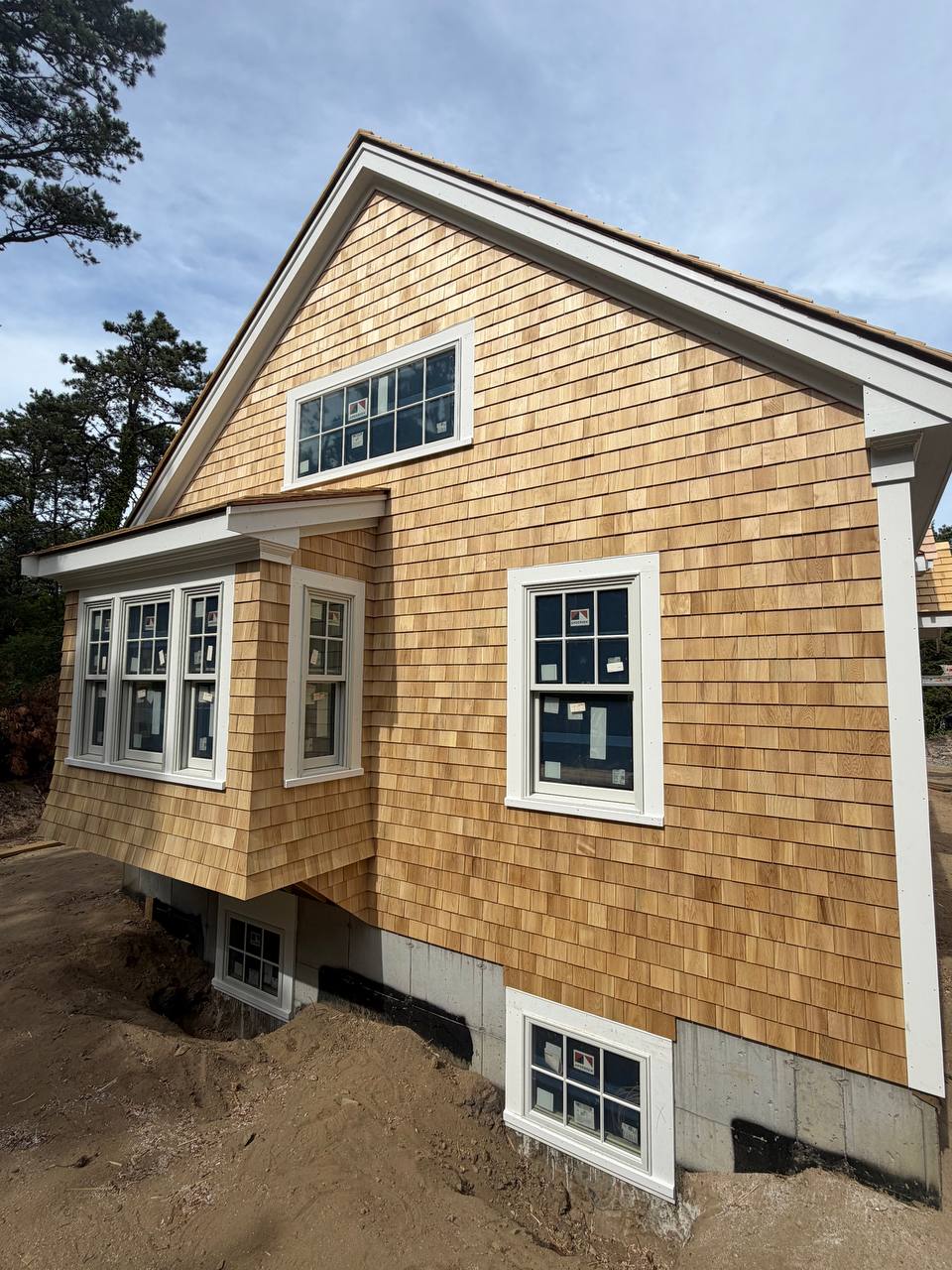 Roof and siding connection