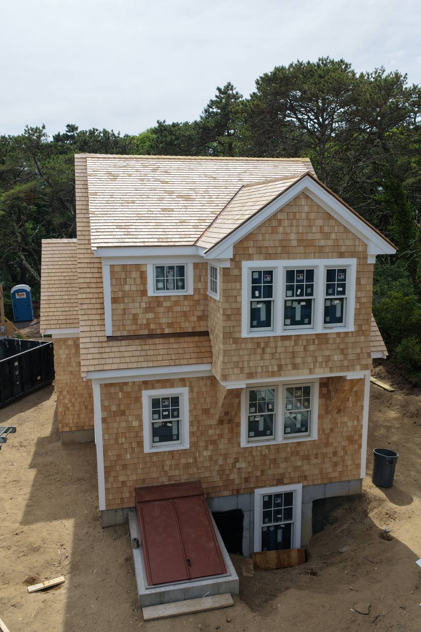 Wellfleet yellow cedar roof and white cedar sidewall installation
