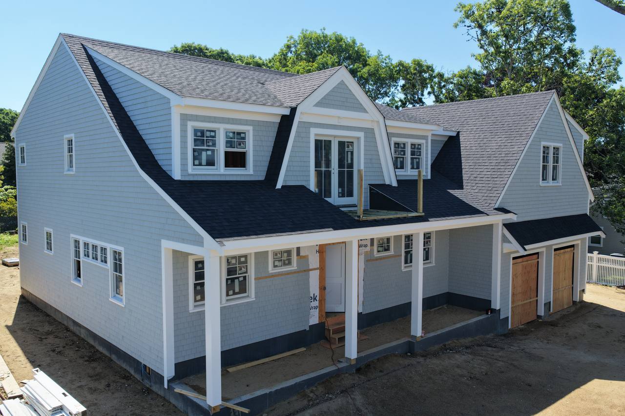 White cedar siding installation Falmouth full house view