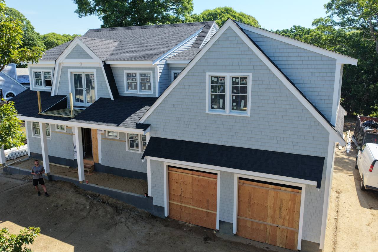 Side elevation white cedar siding and roof detail