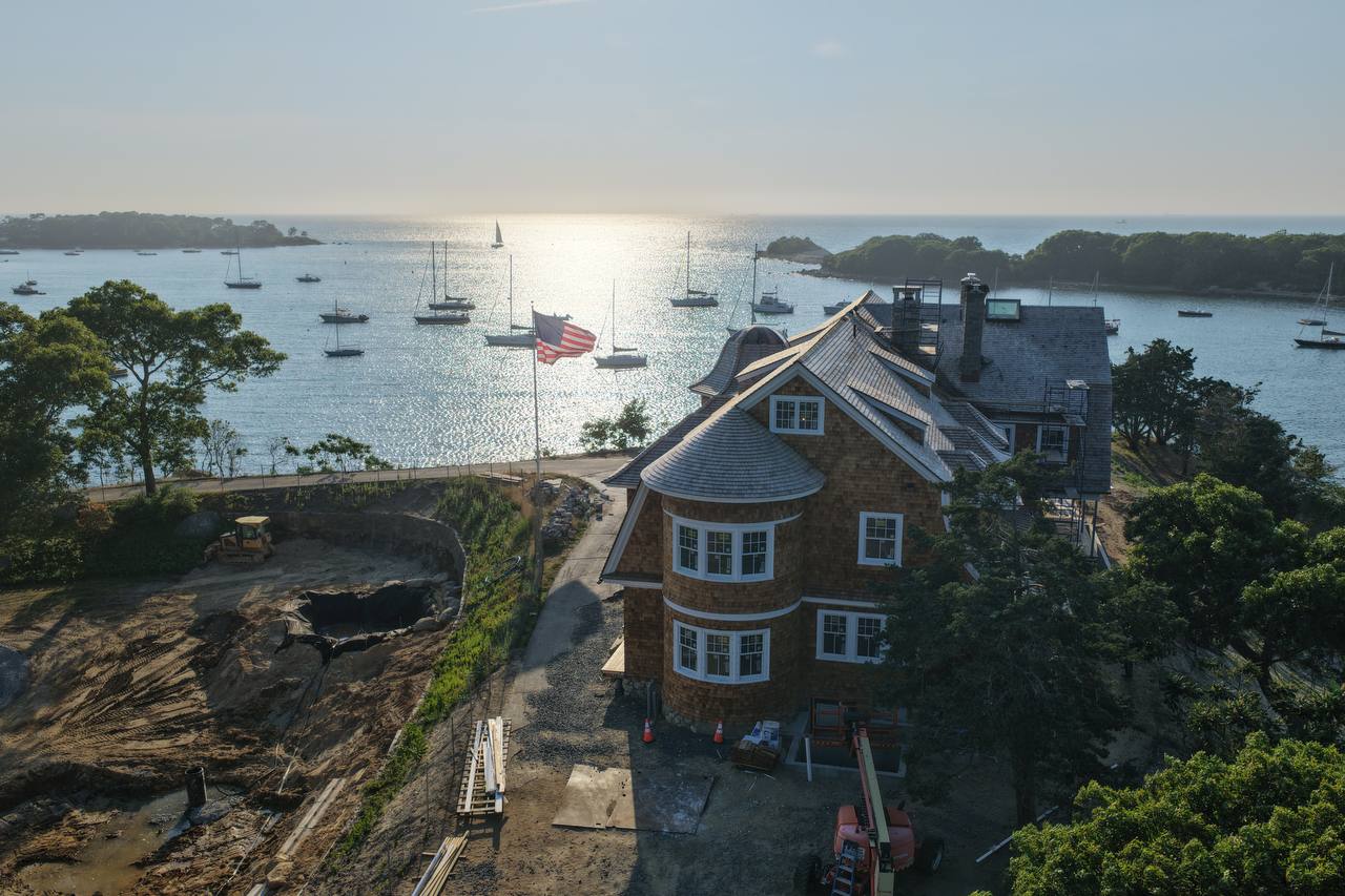 Waterfront estate with copper and cedar roofing Falmouth