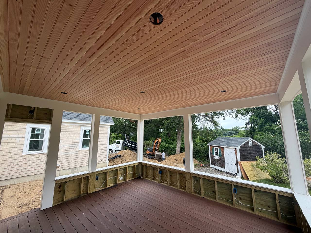 Wood exterior ceiling and composite deck installation Dennis MA