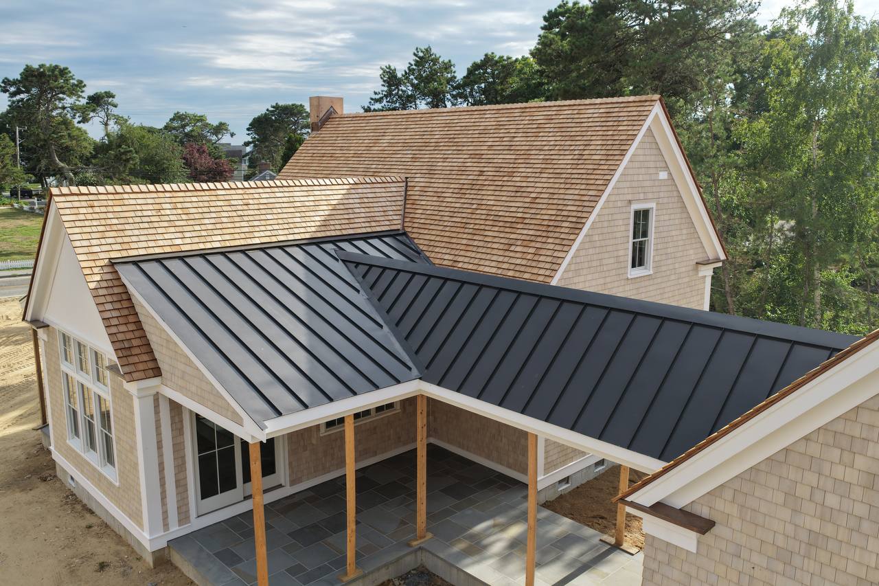 Completed exterior detail with red cedar roof
