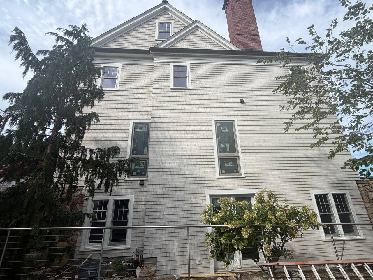 Cotuit home with Enviro Bleach sidewall installation in progress